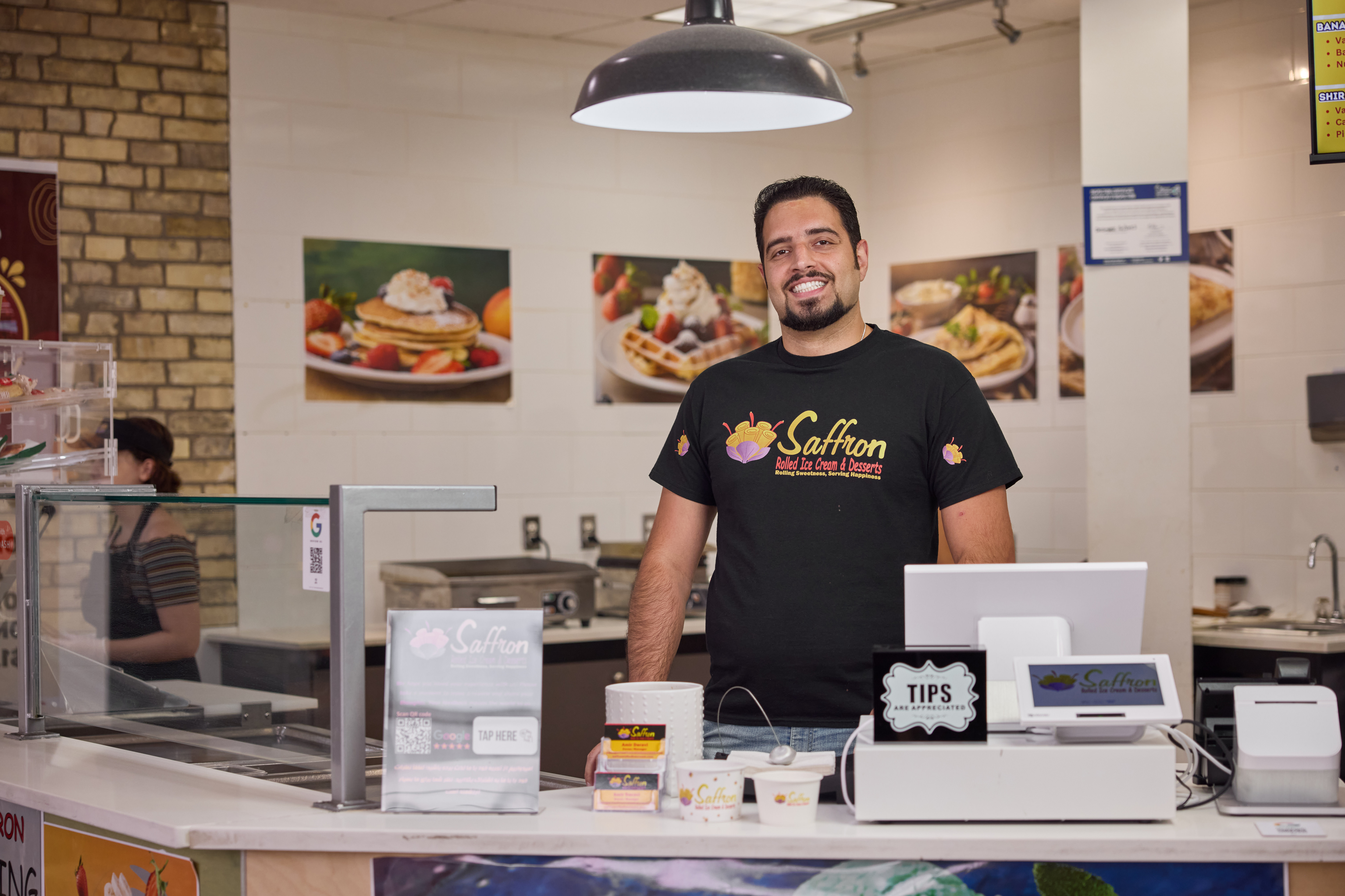 Amir, owner of Saffron Rolled Ice Cream